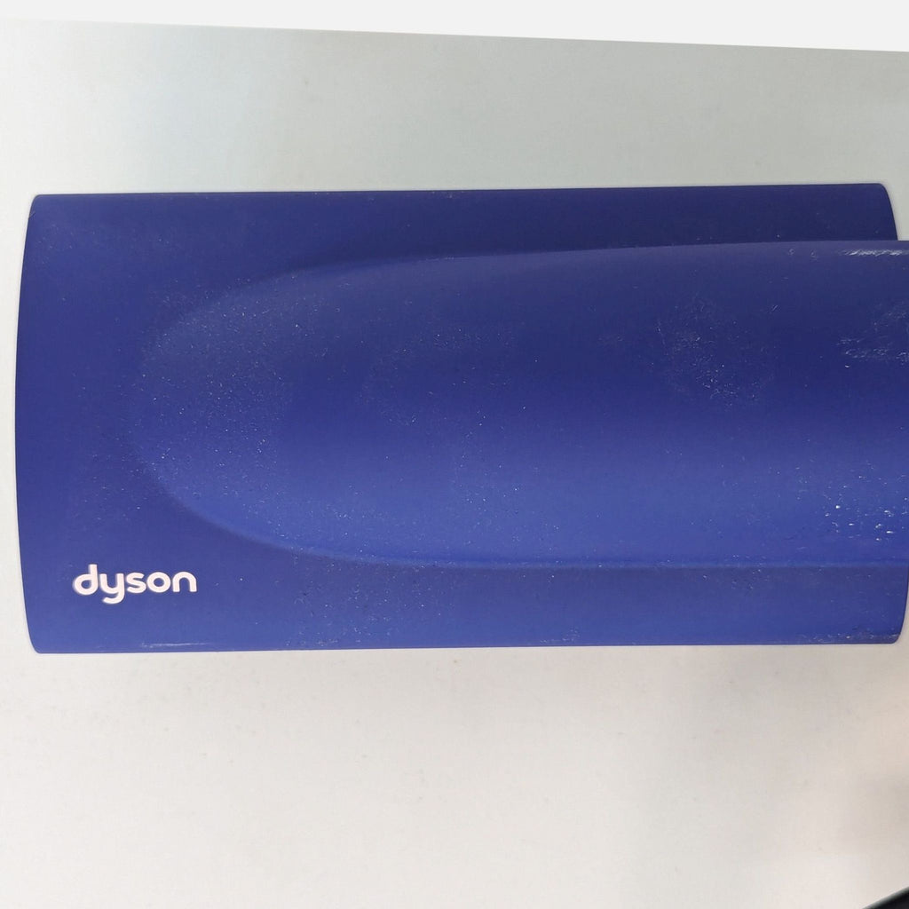 a blue dyson speaker with a black handle.