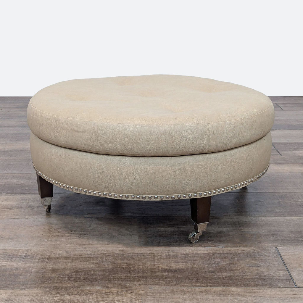 a french cream and cream tufted ottoman