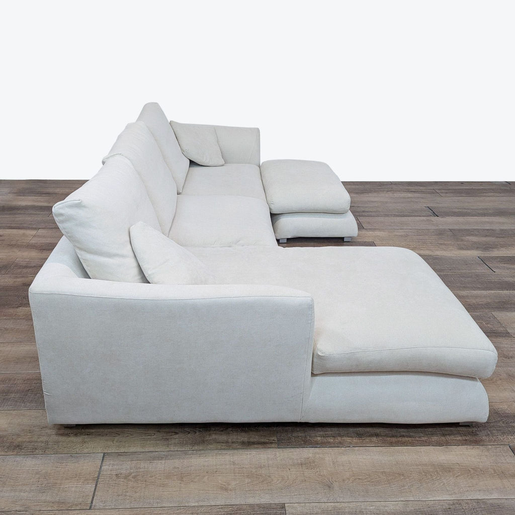 sofa bed is a modern and comfortable piece of furniture that is made of solid white fabric. the