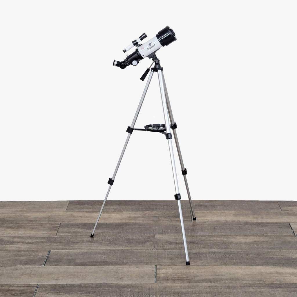 a telescope on a tripod.