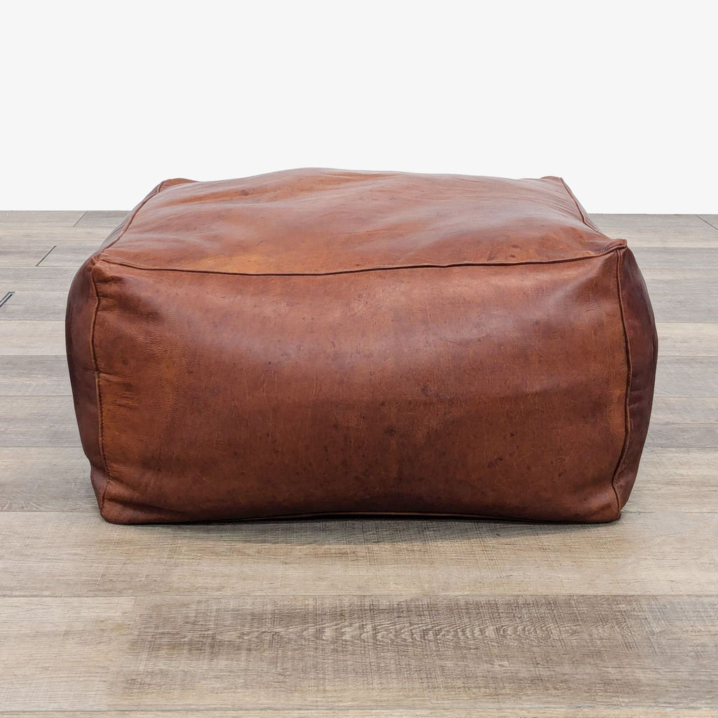 leather ottoman with a leather cover