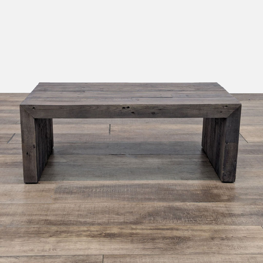 the coffee table is made from reclaimed wood.