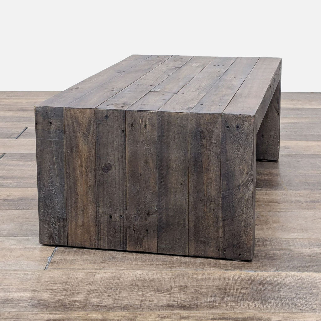 the coffee table is made from reclaimed wood.