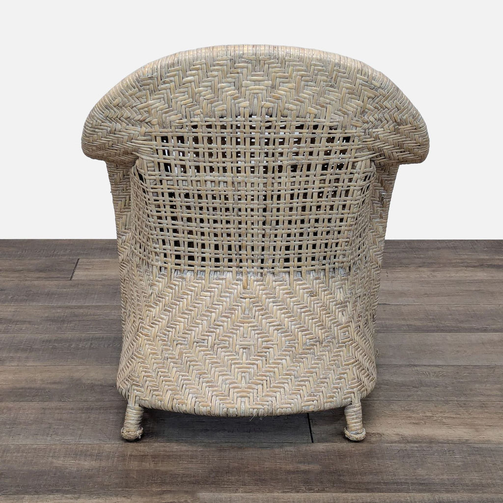 a pair of wicker chairs