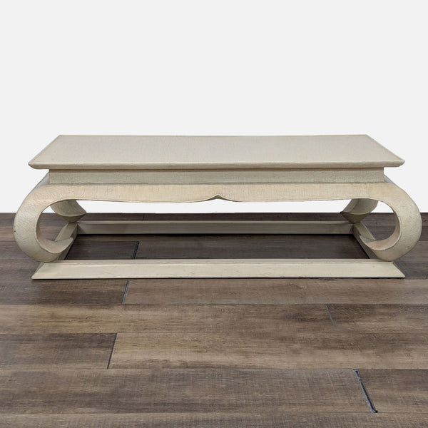 a coffee table with a carved top