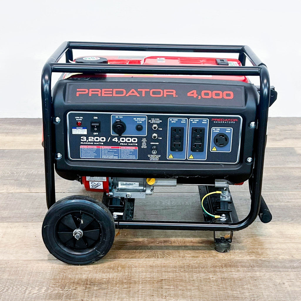 predator 4. 5l portable generator on a wooden table.