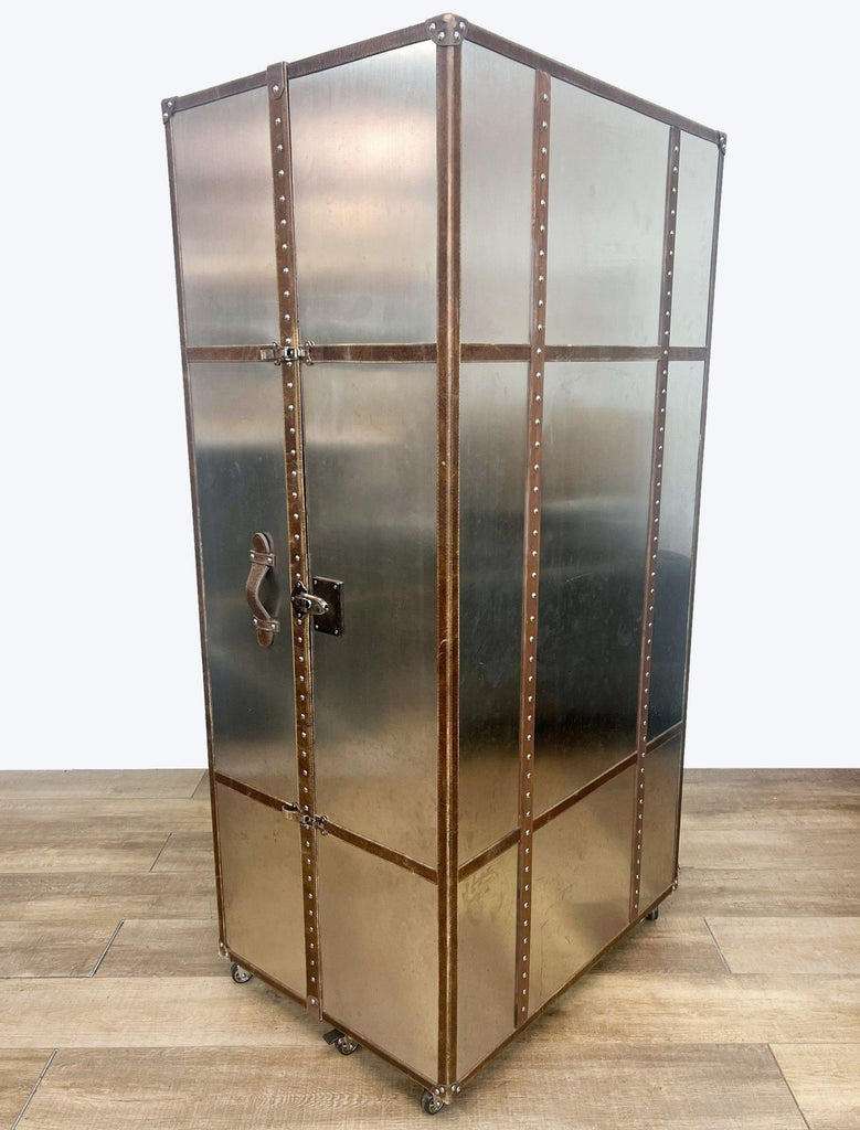 a vintage brass and glass cabinet