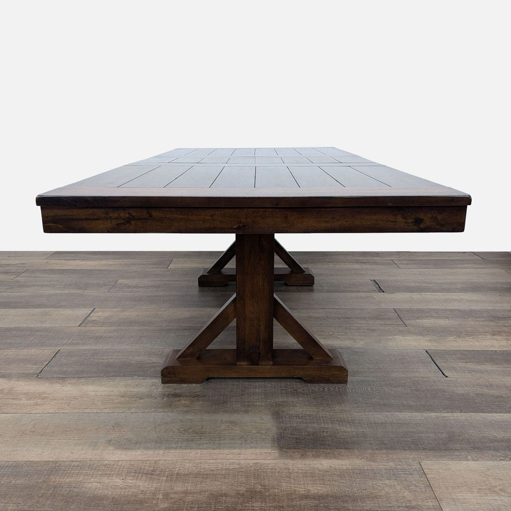 a square dining table with a square top.