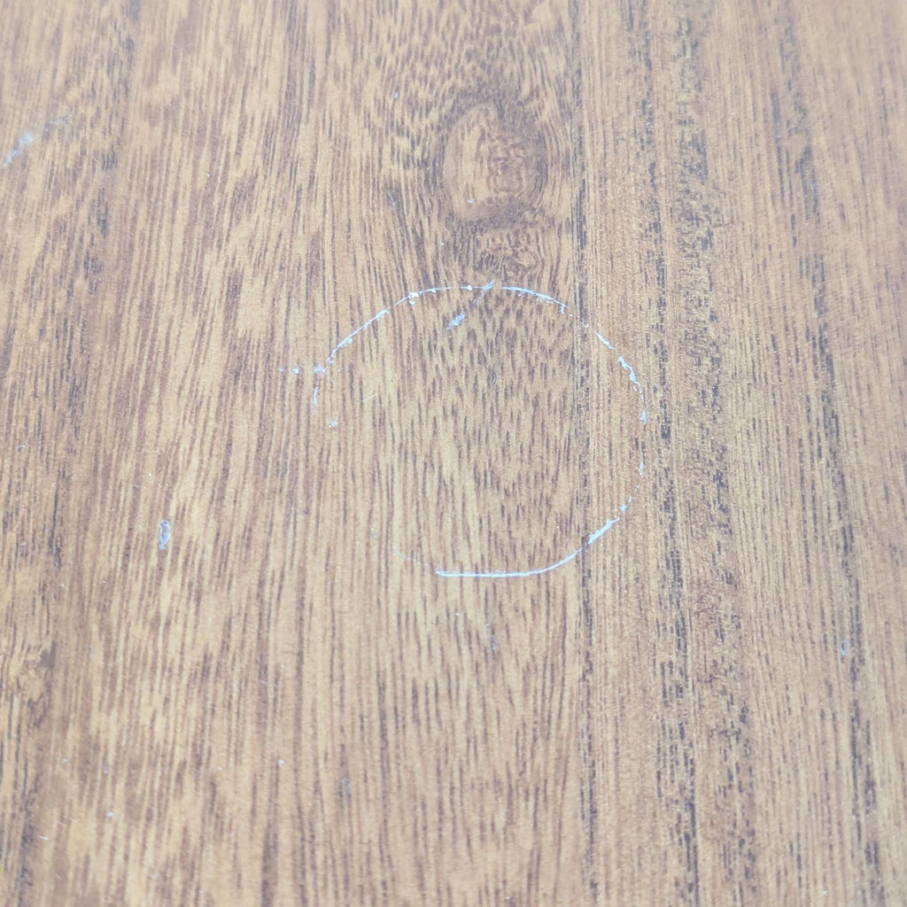 a picture of a wood floor with a circle in it.