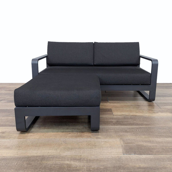Jardin de Ville outdoor sofa with a sleek aluminum frame and Sunbrella fabric cushions. Footstool included.