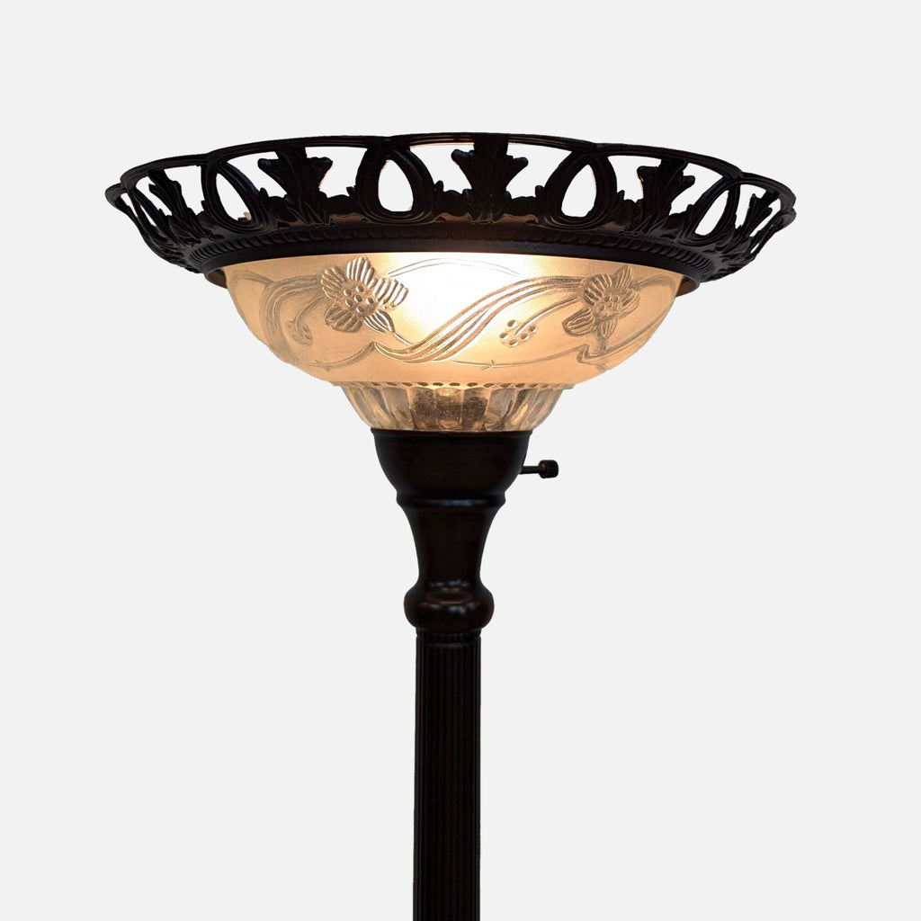 a black and white floor lamp with a black base and a light shade.