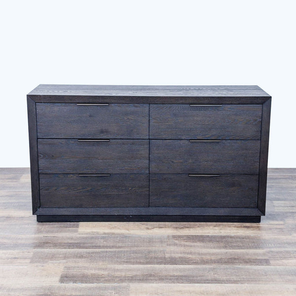 the [ unused0 ] dresser is a dark wood dresser with a dark brown finish.