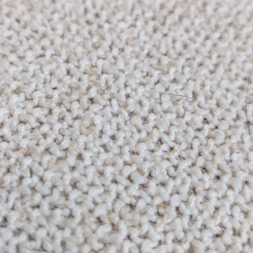 close up of a beige carpet