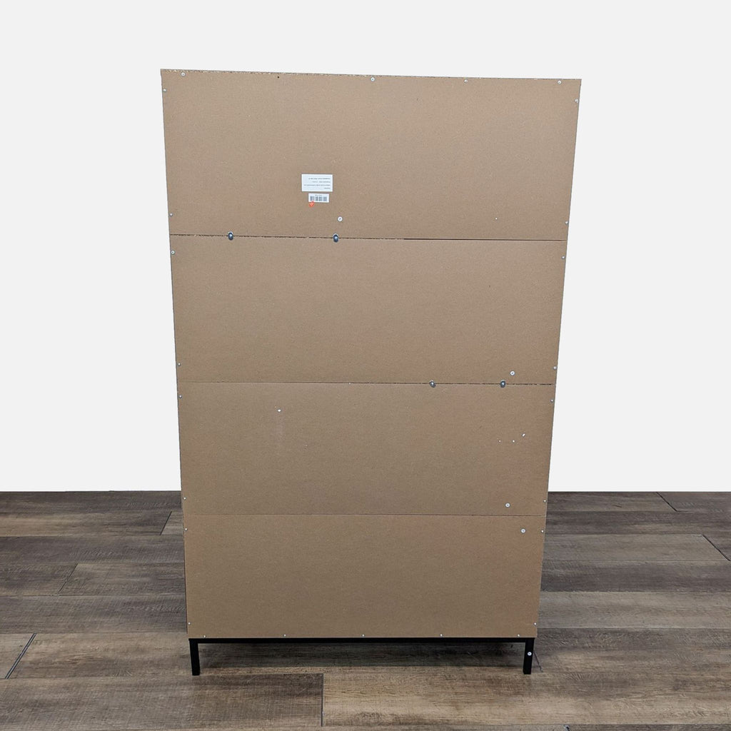 a cabinet with a cardboard box on top.