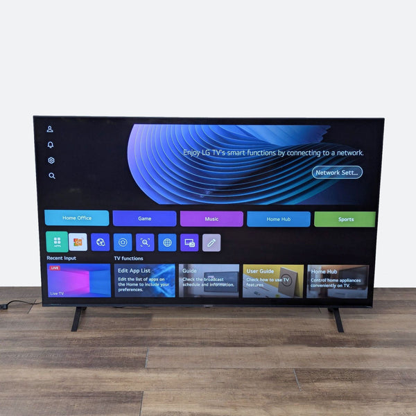 a samsung tv on a stand.