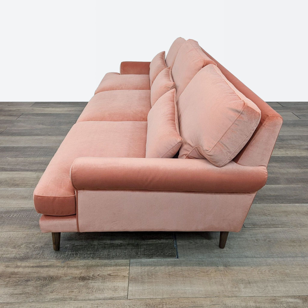 sofa in a peach velvet fabric