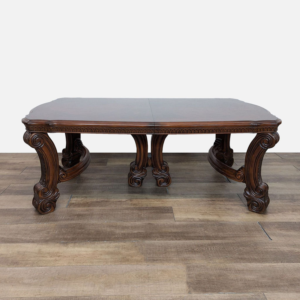 a large antique french walnut dining table