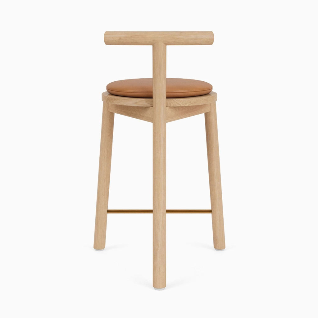 a close up view of a stool with a wooden seat.