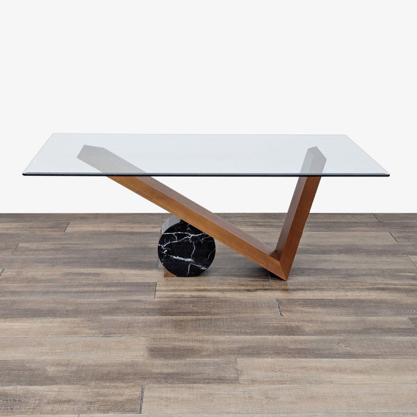 the glass top coffee table is a modern coffee table with a glass top and a black marble base