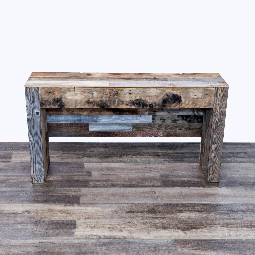 the rustic wood coffee table is made from reclaimed wood and has a rustic look.