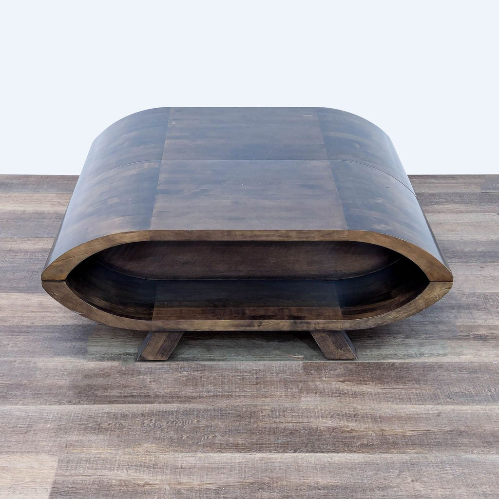 the coffee table is made from a walnut and walnut veneer.