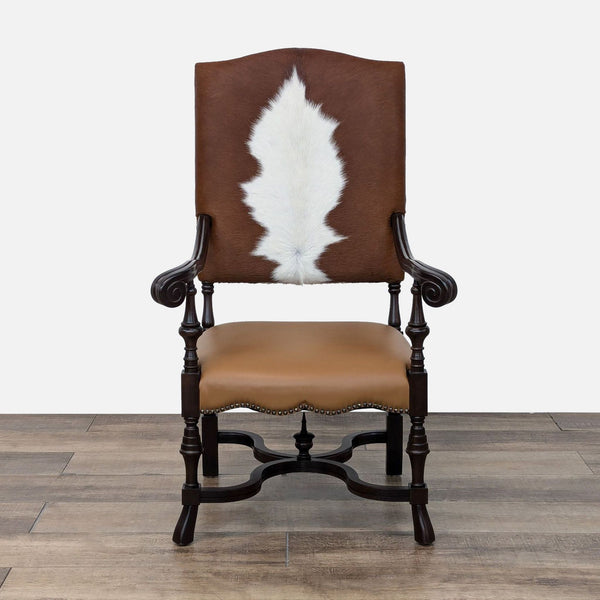 a [ unused0 ] style rocking chair with a cow hide