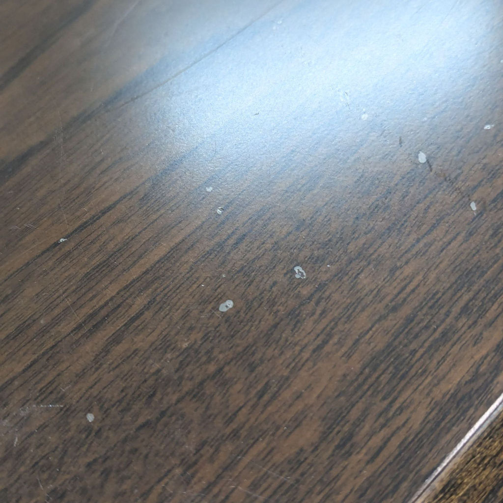 a picture of a wood floor with a stain on it.