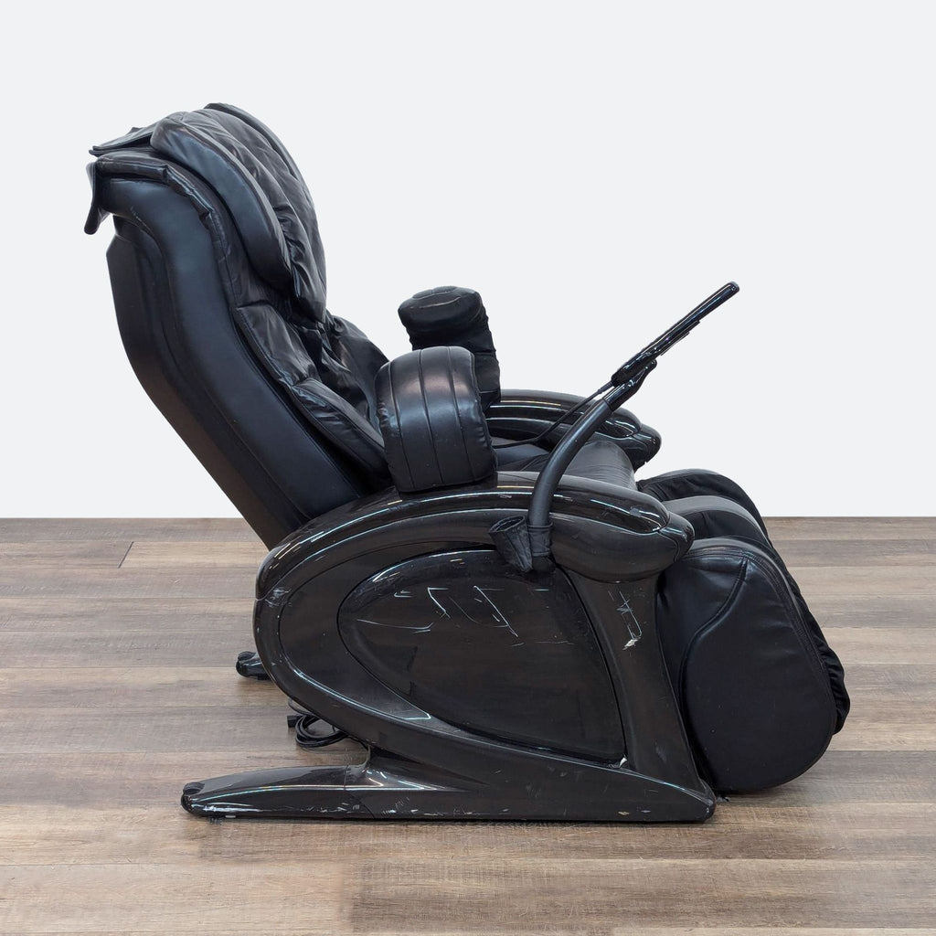 a black leather recliner chair with a black seat.