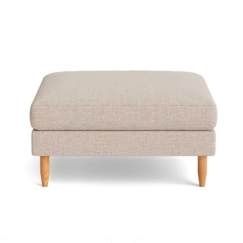 a pair of footstool in a light grey fabric.