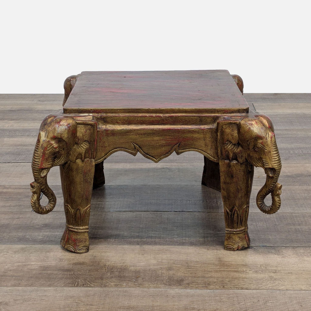 a vintage indian elephant coffee table