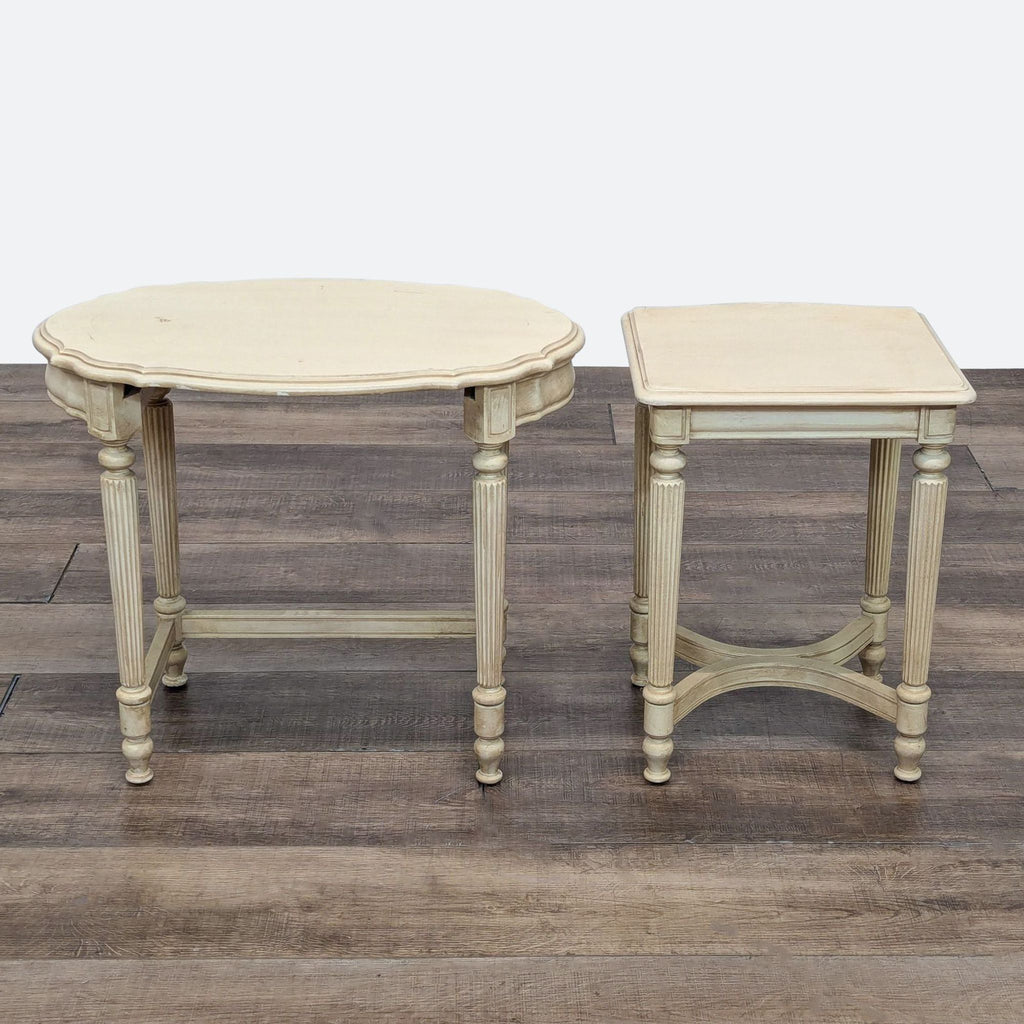 a pair of french cream painted side tables