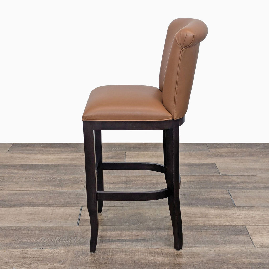 the [ unused0 ] bar stool with a leather back and a brown leather seat