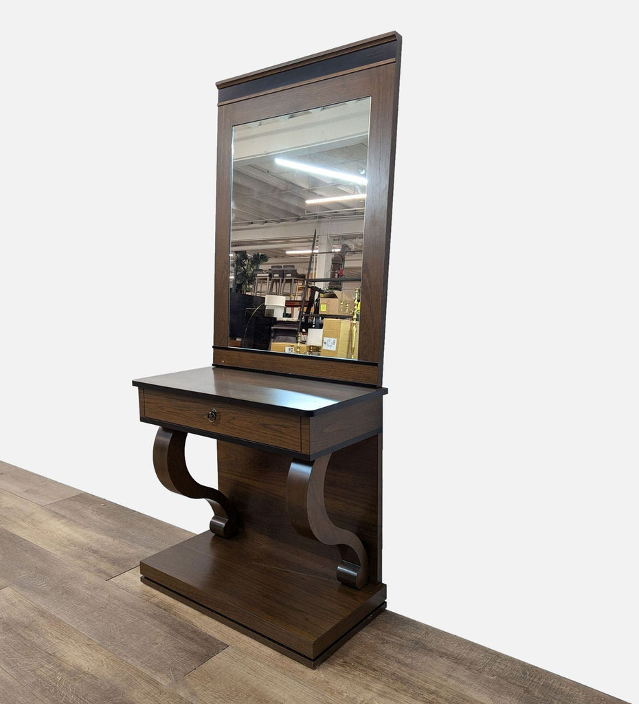 a dressing table with a mirror and a mirror.