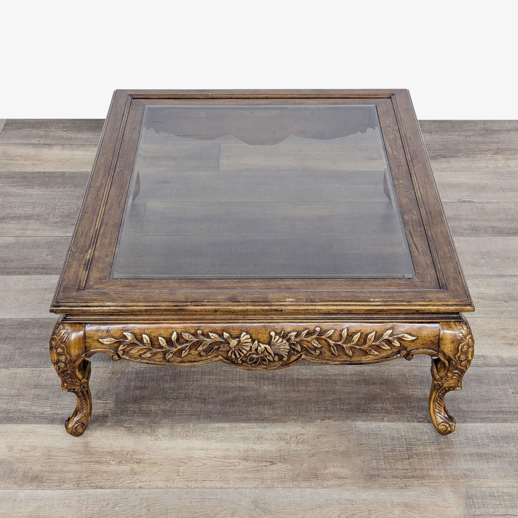 Carved and Gilded Glass Top Coffee Table