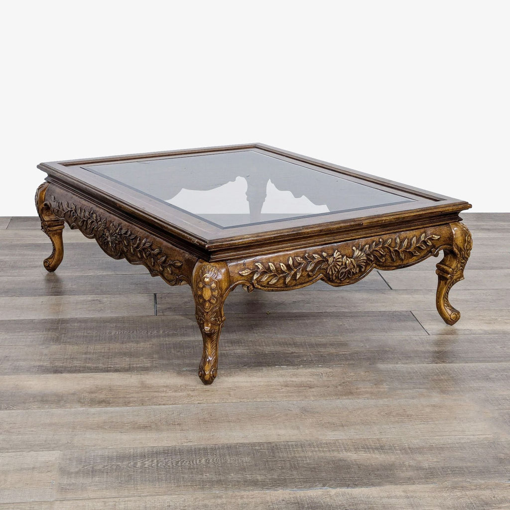 Carved and Gilded Glass Top Coffee Table