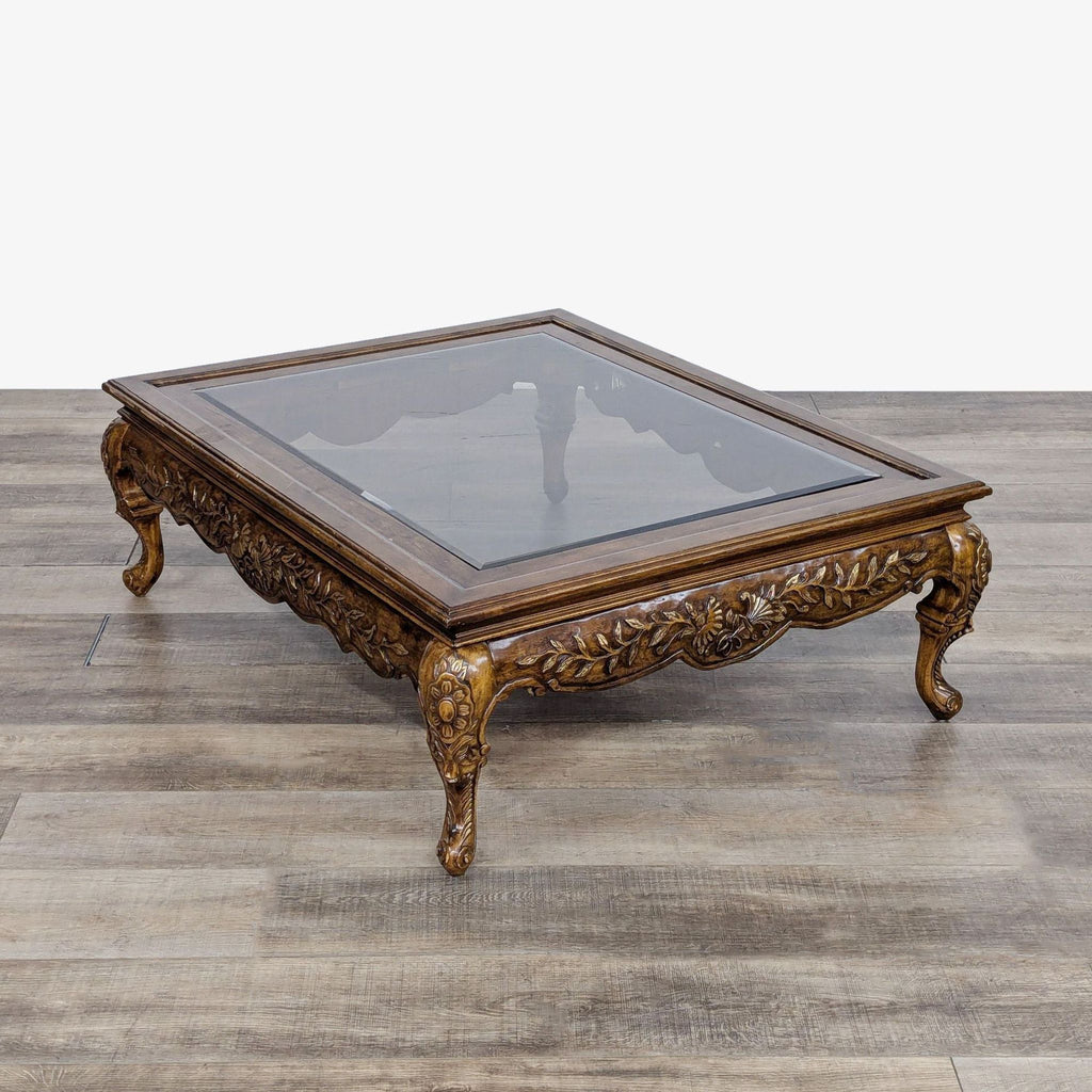 Carved and Gilded Glass Top Coffee Table