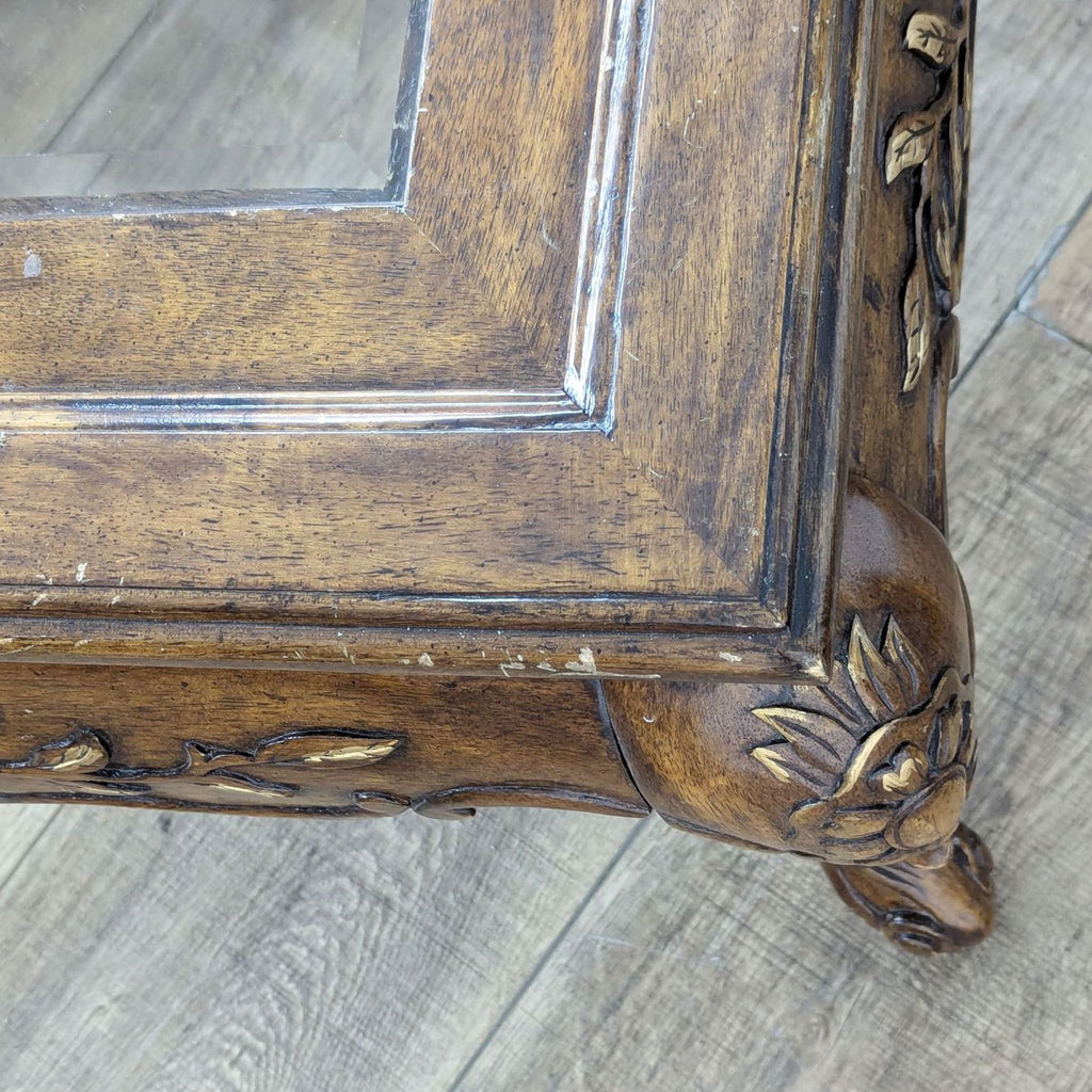 a pair of antique french carved wood framed mirrors