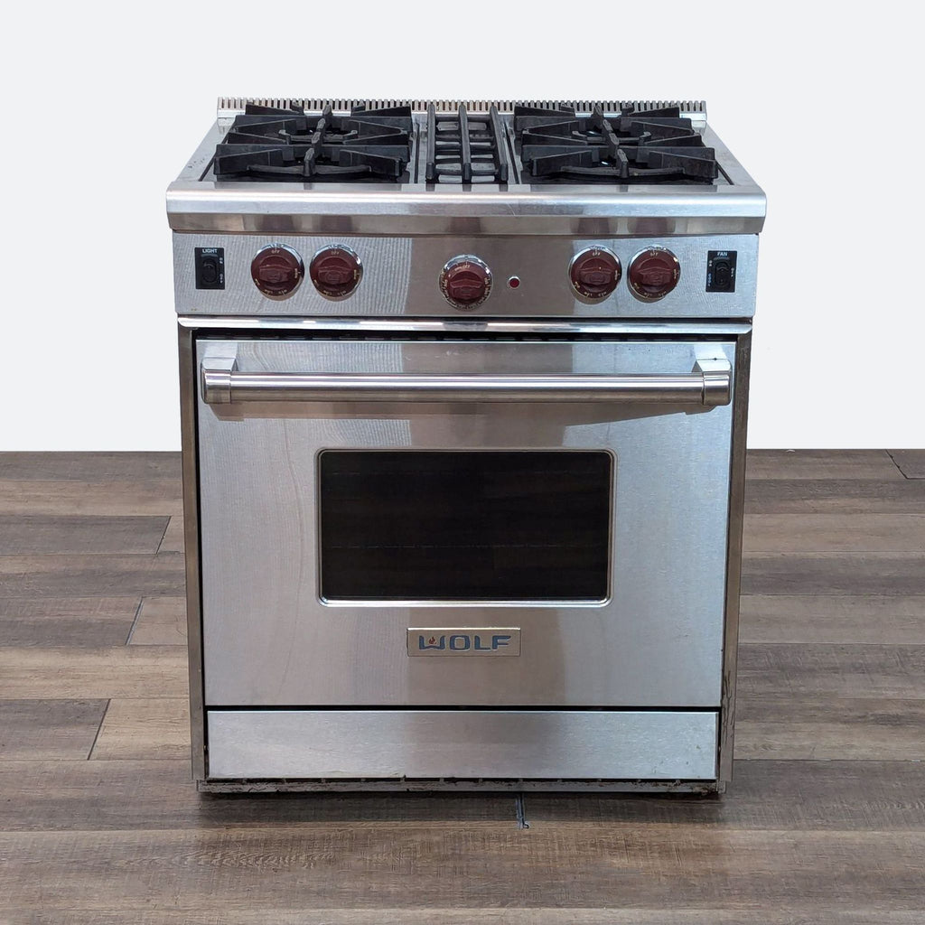 the [ unused0 ] is a stainless steel double oven with four burners.