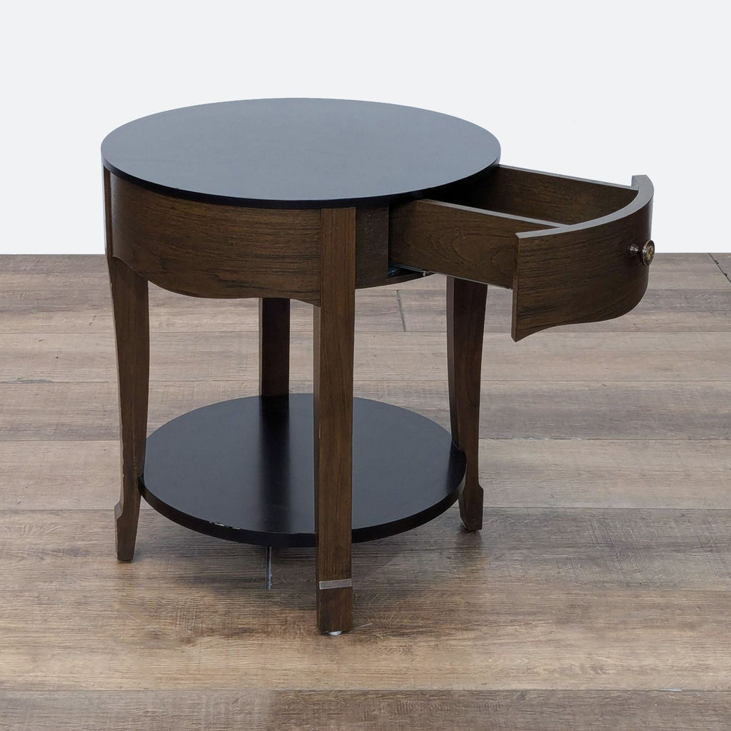 a round table with a curved top and a shelf on top.