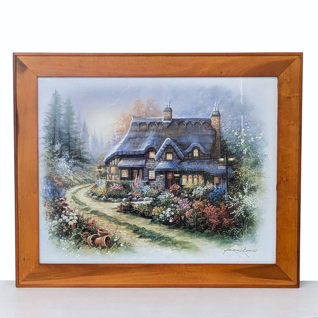 framed oil painting of a cottage in the woods