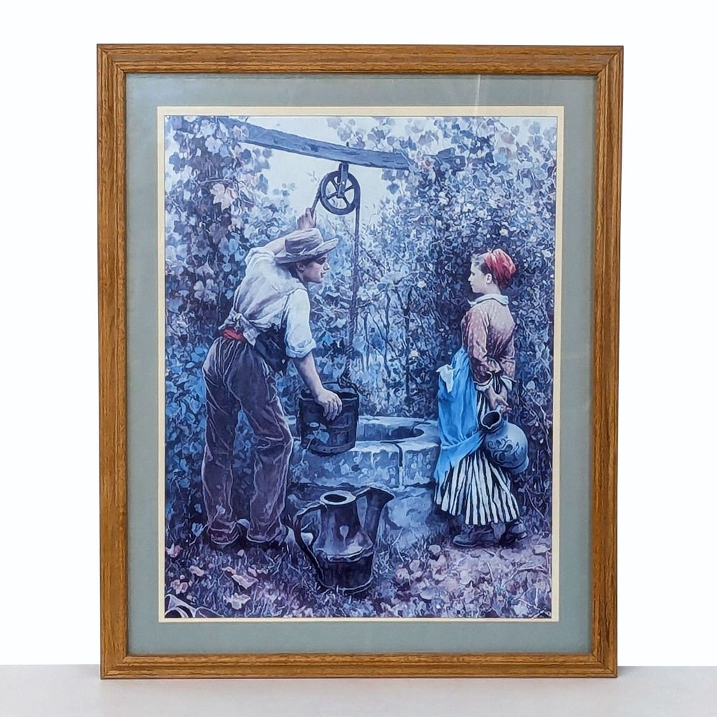 framed print of a woman and a man in a garden