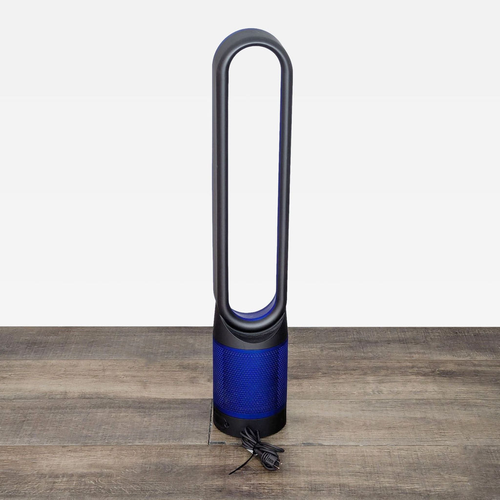 a small blue and white toy airplane on a table 