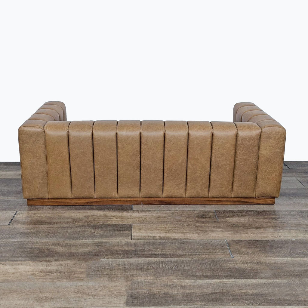 a vintage leather sofa by [ unused0 ] for [ unused0 ]