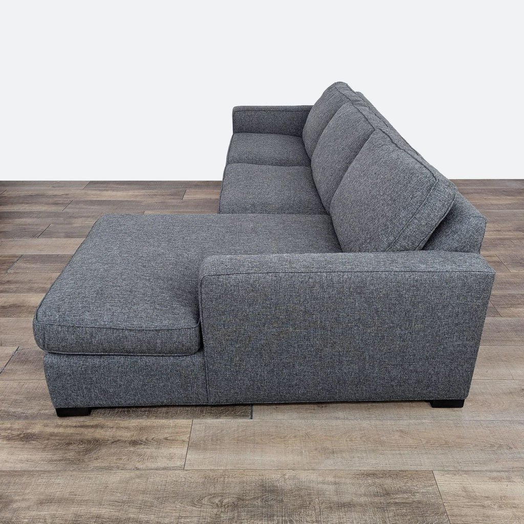 sofa bed is a modern sofa bed that is made of a soft grey fabric. the sofa bed