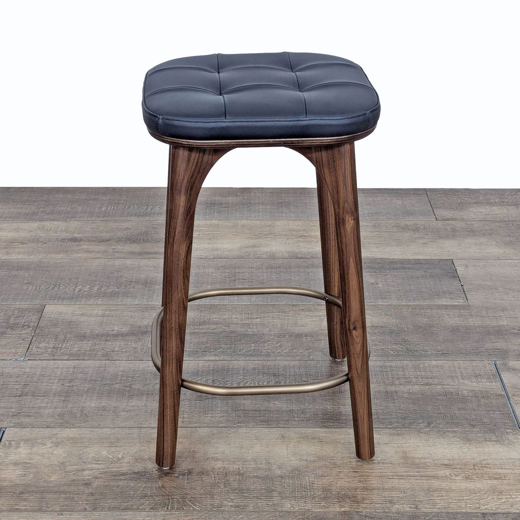 a chair that is sitting on a wooden floor 