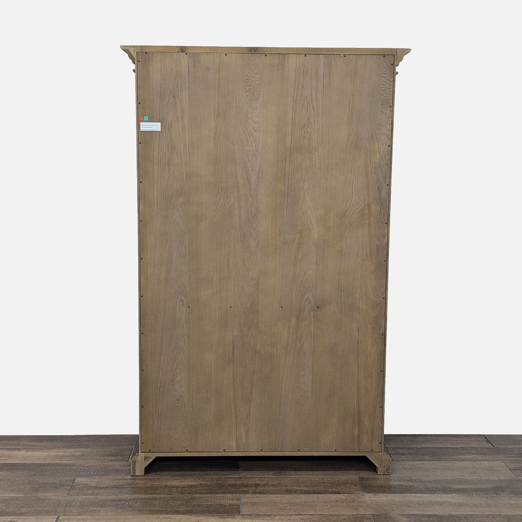 a small wooden refrigerator in a room 