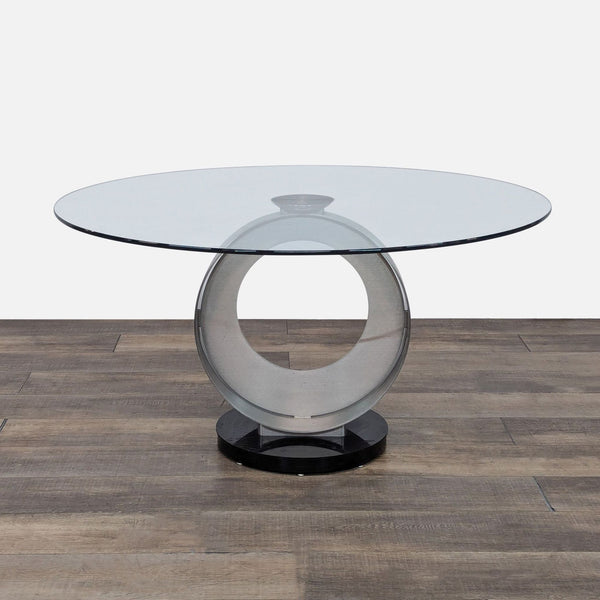 a round glass coffee table with a glass top.