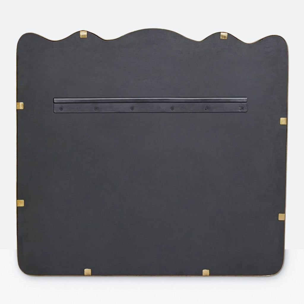 a black leather tray with brass inserts.