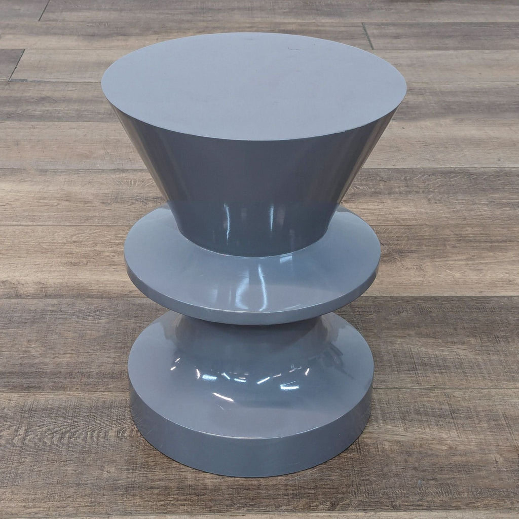 a pair of three - tiered stools in the style of [ unused0 ].