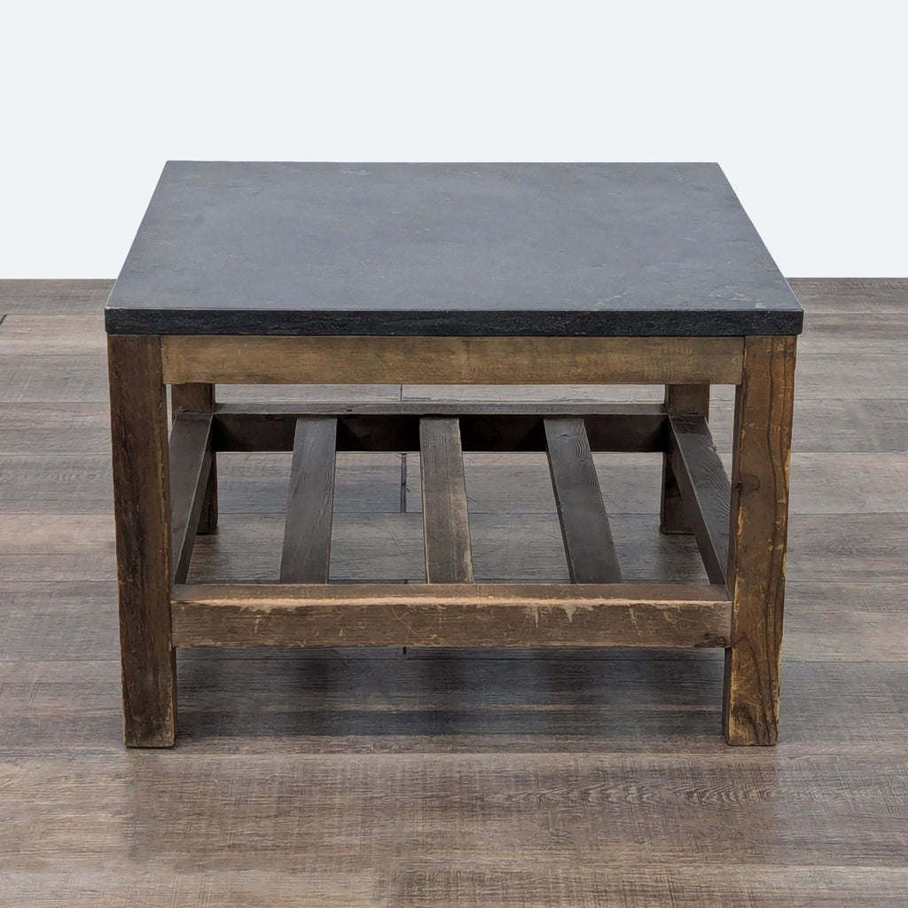 a wooden table with a wooden foot stool 